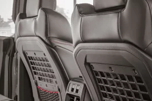 Vehicle seat-back MOLLE panels and storage system