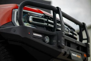 Off-road truck with heavy-duty bull bar and recovery equipment